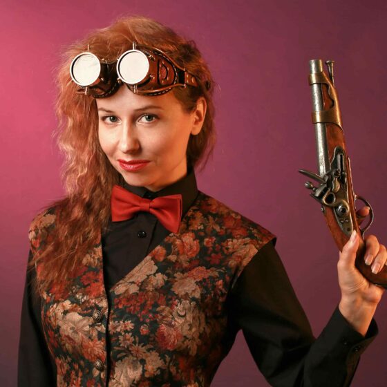 a woman in a steampunk costume