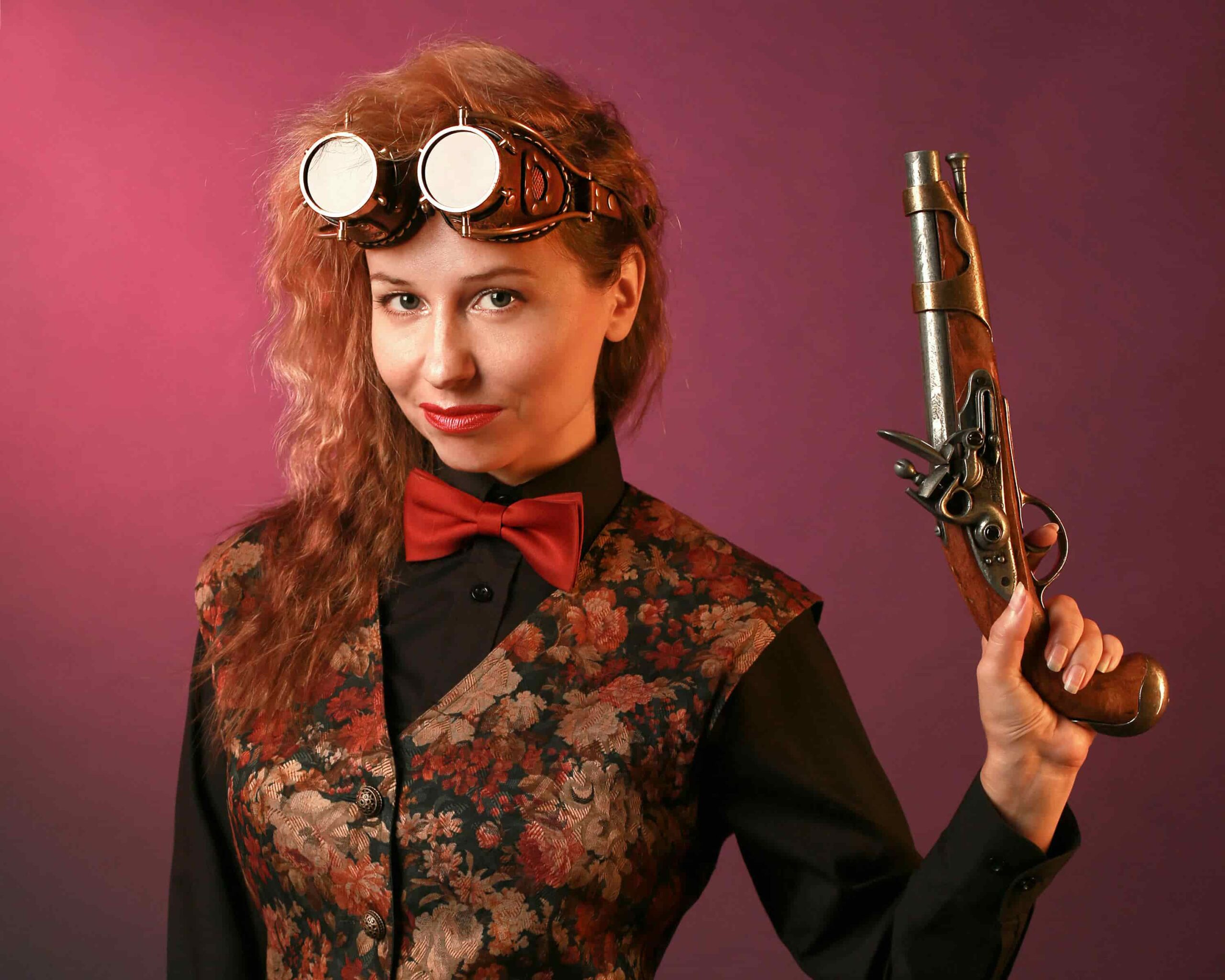 a woman in a steampunk costume